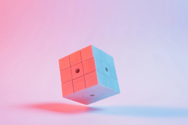 Pelivalikoima iPhone-puhelimille 1 cube on a pink background